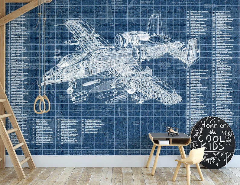 May include: A blue wallpaper mural featuring a detailed white technical blueprint of a military aircraft with extensive labeled parts and grid lines. The design includes technical annotations and specifications printed across the entire surface area.
