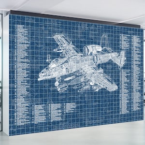 May include: A large wall mural featuring a detailed white technical blueprint of an A-10 Thunderbolt II aircraft on a dark blue background. The design includes intricate mechanical cross-sections, structural components, and numbered lists of parts.