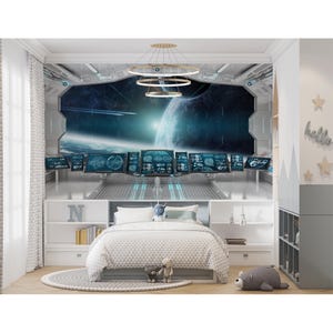 May include: A bedroom with a space-themed mural and decor. The mural depicts a spaceship interior with a view of a planet and space. The bed has a white comforter and a gray rug. There are shelves and a gray storage unit.