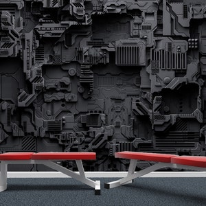 May include: Two weight benches with red padded tops and white frames are positioned in front of a dark gray, textured wall. The wall has a complex, mechanical design. The floor is a dark blue.