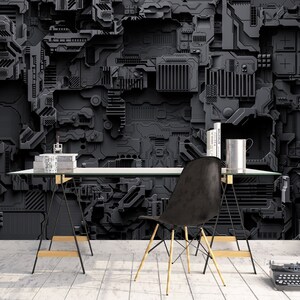 May include: A modern office space featuring a black, textured wall with a complex, geometric design. A glass-top desk with black legs and a black chair are in front of the wall. A vintage typewriter sits on the floor.