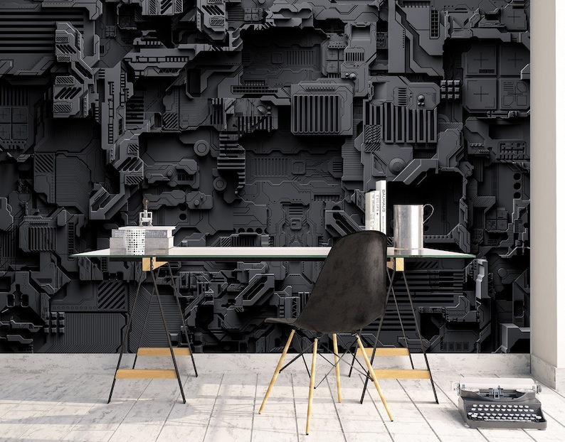 May include: A modern office space featuring a black, textured wall with a complex, geometric design. A glass-top desk with black legs and a black chair are in front of the wall. A vintage typewriter sits on the floor.