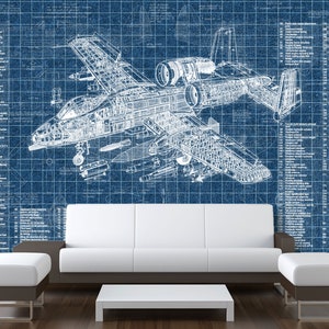May include: A wall mural featuring a detailed white technical blueprint of an A-10 Thunderbolt II aircraft on a blue grid background, complete with extensive numbered parts lists and technical annotations displayed on both the left and right sides.
