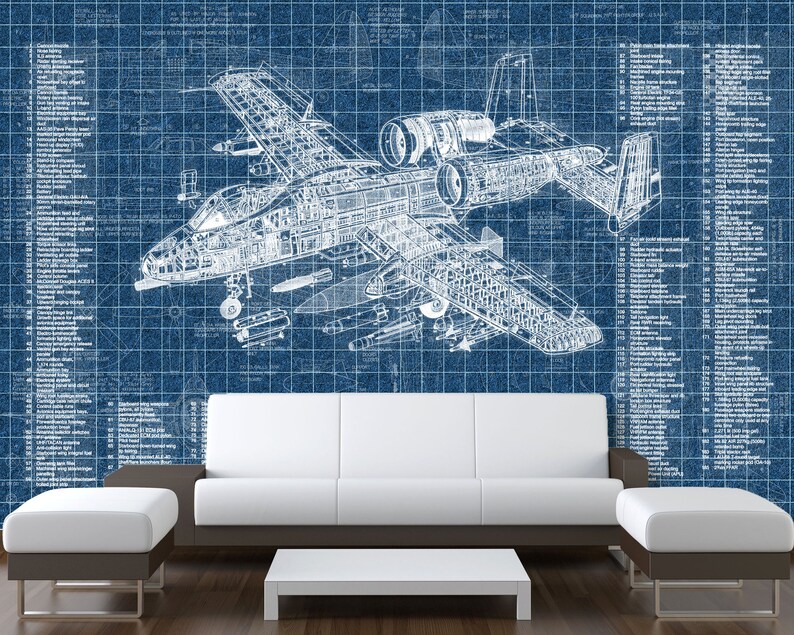 May include: A wall mural featuring a detailed white technical blueprint of an A-10 Thunderbolt II aircraft on a blue grid background, complete with extensive numbered parts lists and technical annotations displayed on both the left and right sides.