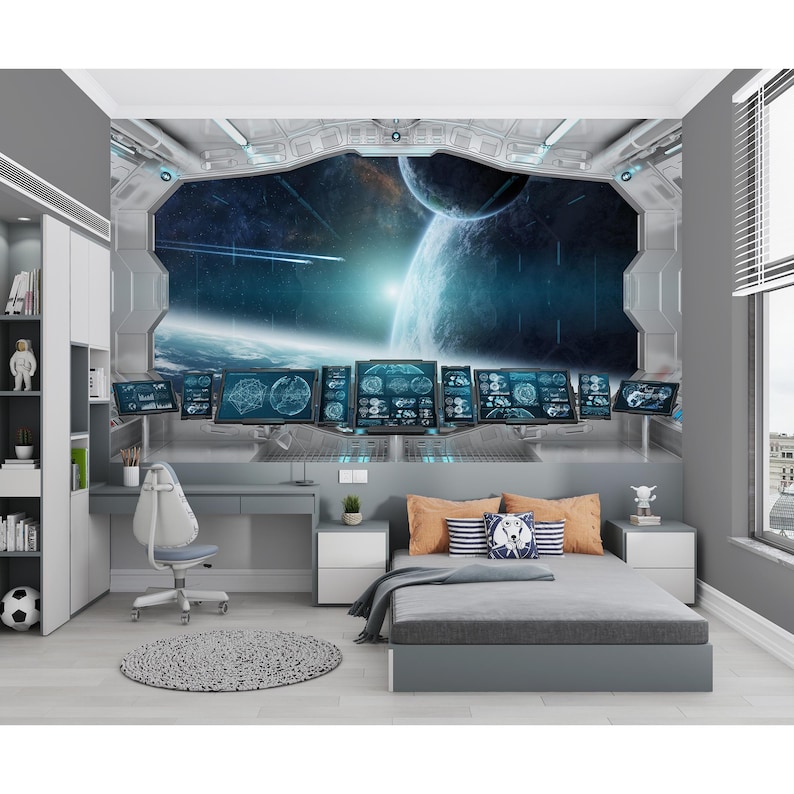 May include: A bedroom with a space-themed mural. The mural depicts a futuristic spaceship interior with a view of planets and stars. The room includes a bed, desk, chair, and a round rug. The color scheme is primarily gray and blue.