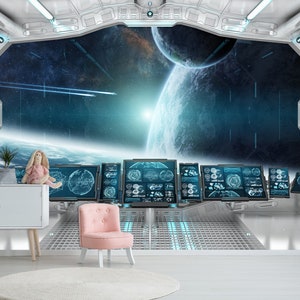 May include: A futuristic interior scene with a large window overlooking a space scene with planets and stars. The room features a white cabinet, a pink chair, and multiple computer screens. A stuffed bunny sits on the cabinet.