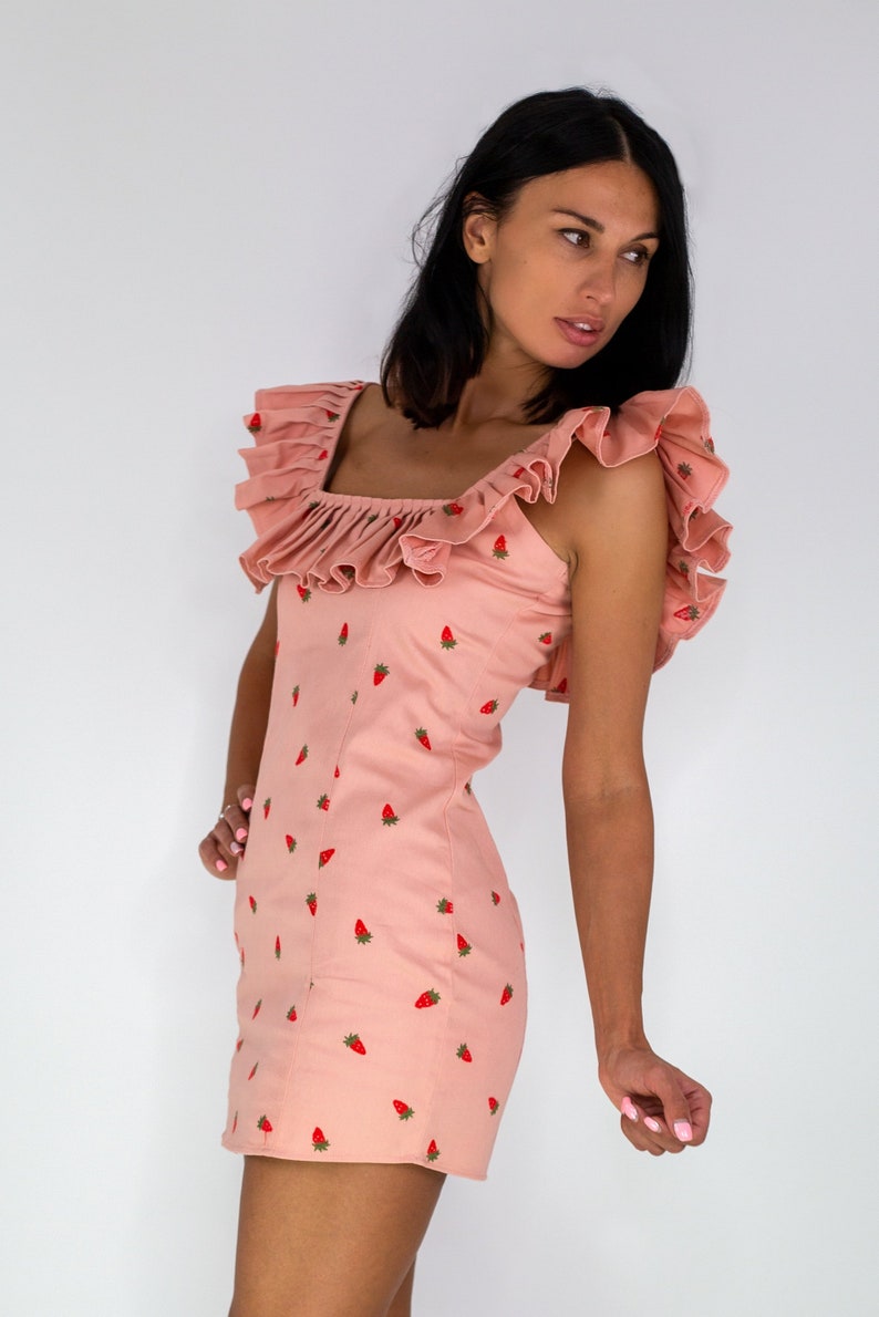Mirabelle strawberry print peach mini dress with statement frill neck