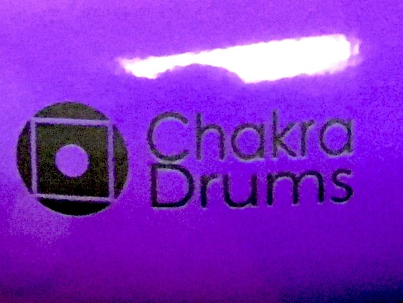 432 Hz Metal Chakra Drum Logo White 7.5 x 4