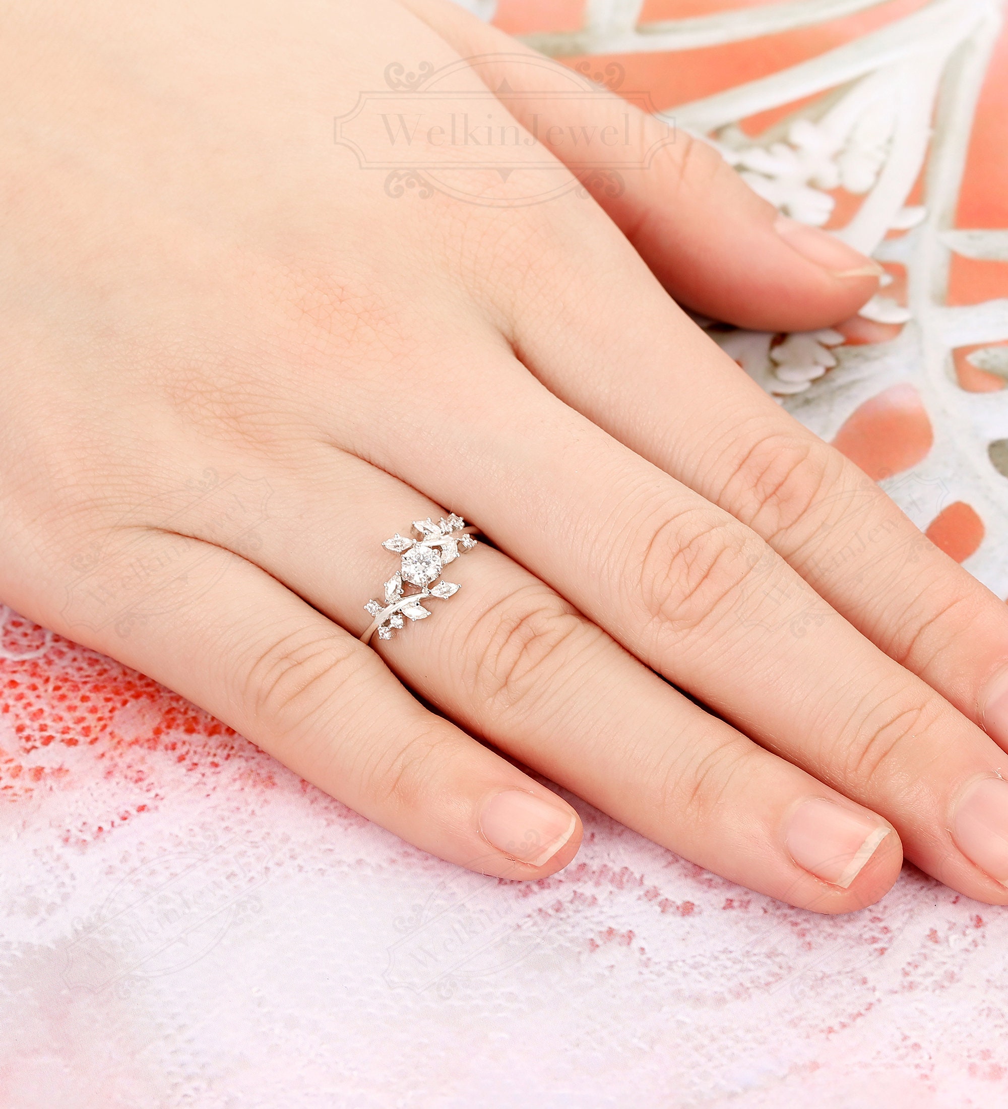 Two wedding rings with white flowers. Love concept. AI Generated 25287357  Stock Photo at Vecteezy