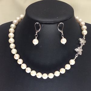 Pearl necklace with feature butterfly clasp
