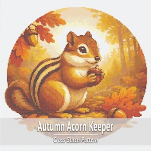 May include: A cross stitch pattern titled Autumn Acorn Keeper featuring a chipmunk holding an acorn in a forest setting with orange and yellow autumn leaves. The circular design displays a brown and white striped chipmunk surrounded by fall foliage.