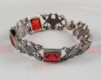 Pulsera Art Nouveau antigua con forma de agapornis de plata de ley y cristal rubí (alrededor de la década de 1910)
