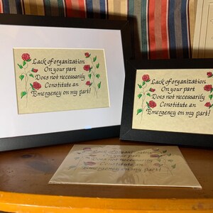 May include: Three framed prints with a humorous saying about organization. The text reads "Lack of organization on your part does not necessarily constitute an emergency on my part!"
