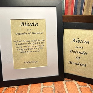 May include: Two framed prints with the name Alexia and the meaning of the name in Greek, "Defender of Mankind". The text includes a quote from Psalms 82:3-4.