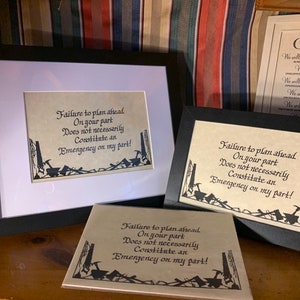 May include: Three framed prints with a black frame and a beige background. The prints feature a black silhouette of tools and the text "Failure to plan ahead. On your part Does not necessarily Constitute an Emergency on my part!"