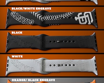 May include: Five different colored Apple Watch bands with a baseball theme. The bands feature the words "Giants" and the San Francisco Giants logo. The colors are white, black, orange, and two variations of black and white.