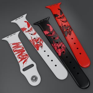 May include: Three silicone watch bands featuring Venom character graphics. One white band with red text and a metal snap, one white band with red graphic details, and one black band with red graphic details. Each band includes a connector and holes.