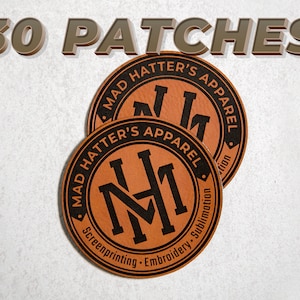 May include: Thirty brown leather patches with the text "Mad Hatter's Apparel" and a stylized "MH" logo. The patches are for screen printing, embroidery, and sublimation.