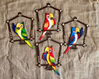 Enchanted tiki room parrot signs