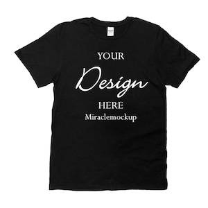 May include: Black t-shirt with the text "YOUR Design HERE Miraclemockup" printed in white.