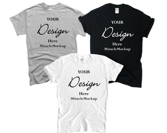 Pode incluir: Três camisetas em cores diferentes: cinza, branco e preto. Cada camiseta tem o texto "YOUR Design Here MiracleMockup" impresso na frente.