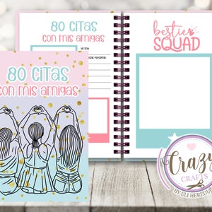 May include: A pink and blue spiral bound notebook with the text "80 CITAS con mis amigas" on the cover. The cover also features three girls holding hands with gold glitter accents. The back cover has the text "bestie SQUAD" and a blank photo frame.
