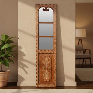 May include: A tall, rectangular wooden wall mirror featuring a dark brown finish with intricate white floral inlay patterns along the frame. The upper section contains three glass mirror panels, while the lower section features a solid wood panel.