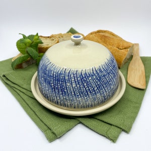 Medium handmade pottery butter keeper with lid.