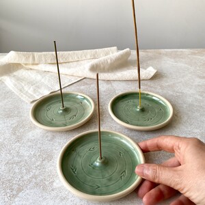 handmade green round ceramic incense holders for meditation and yoga practice