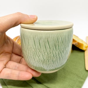 Green small pottery french butter dish for modern kitchen.