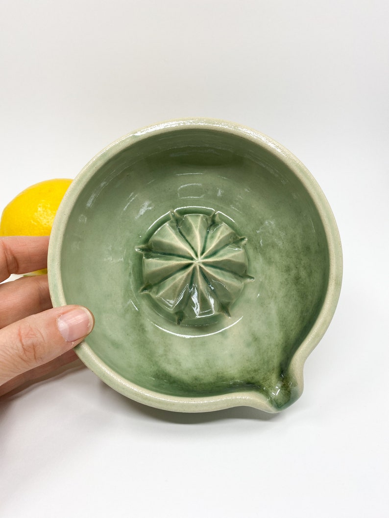 green handmade ceramic lemon juicer for modern kitchen