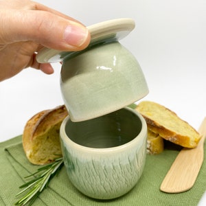 Green small french butter holder for modern kitchen.