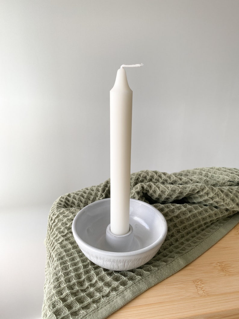 Mini pottery candle holder in nordic style.