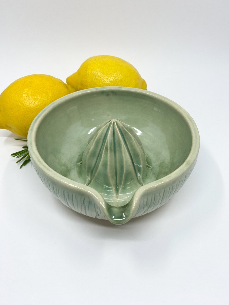 green handmade stoneware ceramic lemon squeezer for modern kitchen