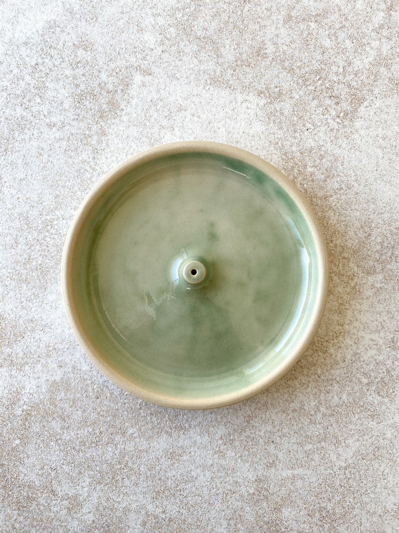 Green sage handmade round ceramic incense holder.