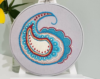 Paisley embroidery with blue, red and white