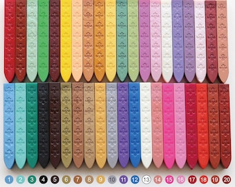 May include: A collection of 40 different colored wax sticks for sealing letters and envelopes. The sticks are arranged in rows with numbers 21 through 40 above them. Below the sticks are 20 more sticks numbered 1 through 20. There are also three containers of wax beads, one in a glass bottle, one in a jar, and one in a plastic bag. The text "All Same Color Number" is at the bottom of the image.
