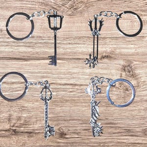 Kingdom hearts keyblade sword keychain lot of 4 keyblades
