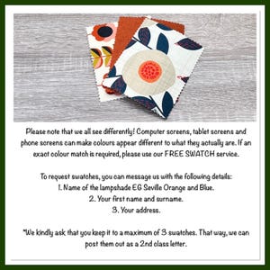 May include: Three square fabric swatches with pinked edges. One swatch features a white background with a large beige flower, orange center, and dark blue leaves. Another has a white background with orange and black floral motifs. One is solid orange.