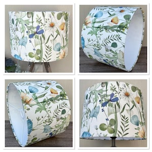 Four images of a white lampshade with a floral pattern. The pattern includes green leaves, blue flowers, yellow flowers. The lampshade is shown from different angles.