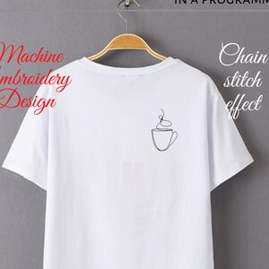 May include: White t-shirt with a black line drawing of a coffee cup with steam on the back. The text "Machine Embroidery Design" is in red on the left side of the image and "Chain stitch effect" is in red on the right side of the image.
