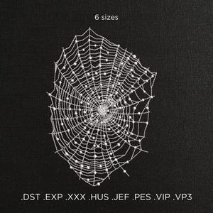 May include: White spider web embroidery design with 6 sizes available in .DST, .EXP, .XXX, .HUS, .JEF, .PES, .VIP, and .VP3 formats.