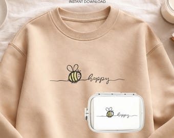 May include: A beige sweatshirt with a bee and the word "happy" embroidered in black. A white embroidery hoop with the same design is in the foreground. The text "DIGITAL FILE INSTANT DOWNLOAD" and "machine embroidery design" are also visible.