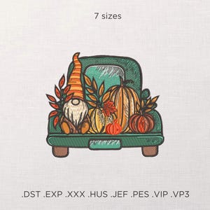 May include: An embroidered design featuring a green truck bed filled with pumpkins, fall leaves, and a gnome wearing an orange and yellow striped hat. The text "7 sizes" is at the top.