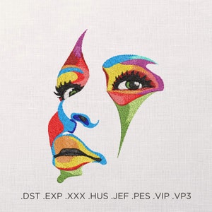 Op de afbeelding: Een kleurrijk geborduurd ontwerp van een vrouwen gezicht met een kleurenschema van rood, blauw, groen, geel en roze.