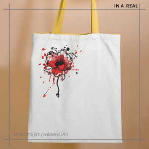 May include: White canvas tote bag with yellow handles. The bag features a red poppy flower with black outlines and red and black paint splatters.