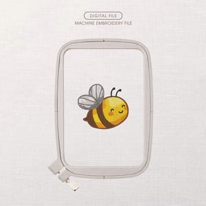 May include: A machine embroidery file featuring a cartoon bee design. The bee is yellow and brown with gray wings and a smiling face. The design is inside a rectangular embroidery hoop. Text at the top reads "DIGITAL FILE" and "MACHINE EMBROIDERY FILE".