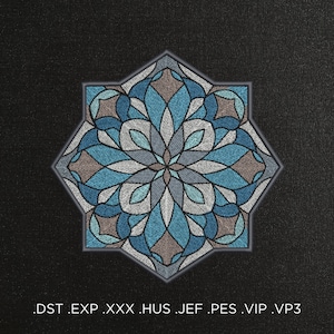 May include: A blue, gray, and white embroidered mandala design with a starburst shape. The design is on a dark gray background.