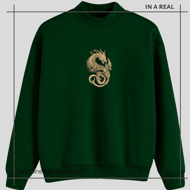 May include: A dark green sweatshirt with a gold embroidered dragon design on the front. The text "IN A REAL" is in the top right corner of the image.