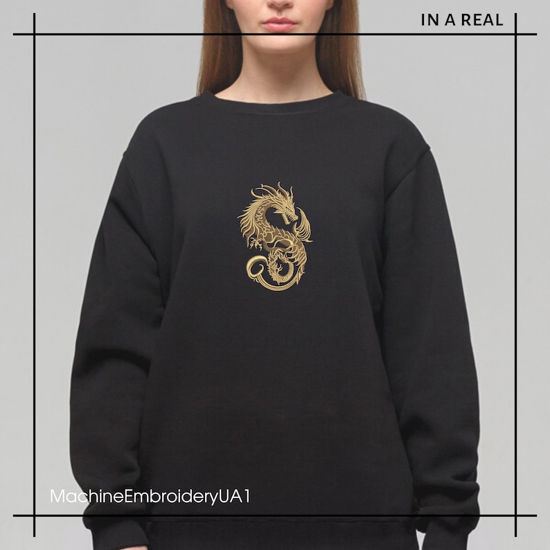 May include: Black sweatshirt with a gold embroidered dragon design. The text "MachineEmbroideryUA1" is at the bottom of the image.